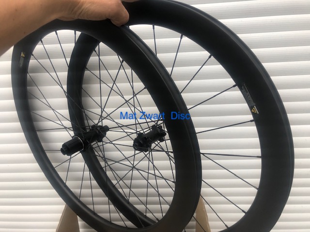 Prominent Gedeeltelijk porselein Carbon Disc Wielset 50mm hoog 11/12speed Naven Steekas 12mm , Center-lock ,  Clincher - Delta Bikes